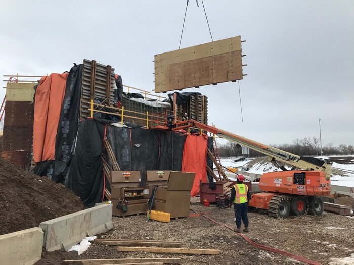 Photo: Crews set forms for the east bridge abutment near Etna Street.