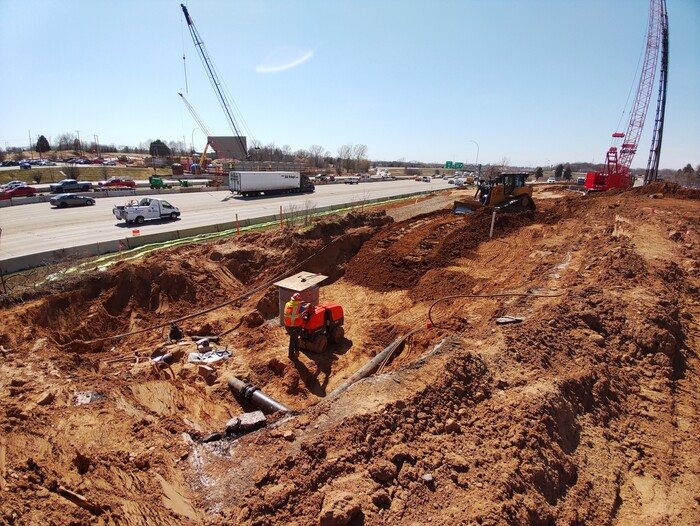 Crews drive pile and continue work on the north Bielenberg Drive bridge abutment. 