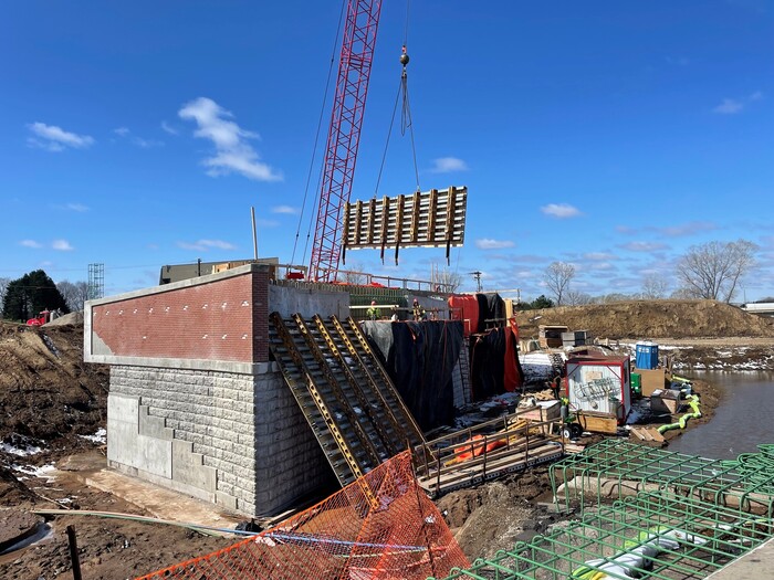 Crews build bridge abutment in Woodbury. 