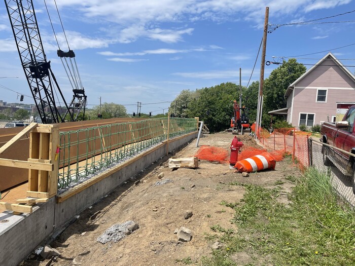 Crews construct a retaining wall in East St. Paul. 