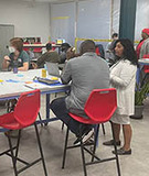 People meet to discuss Blue Line Extension project