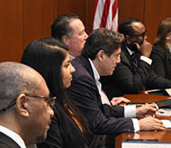 Five Met Council members seated at table