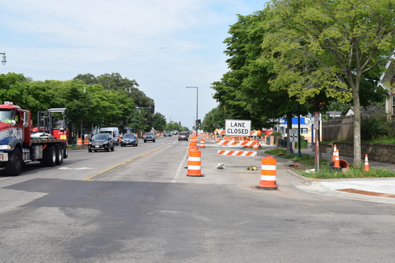 an image of Lake Street showing 3 vehicle lanes and a closed construction lane