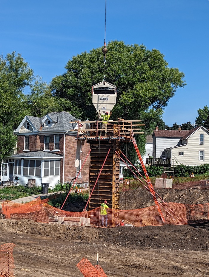 Crews construct foundations for the new Maple Street pedestrian bridge