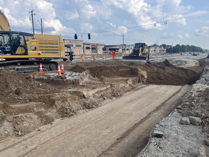 Crews excavate a driveway on Bielenberg Drive in Woodbury