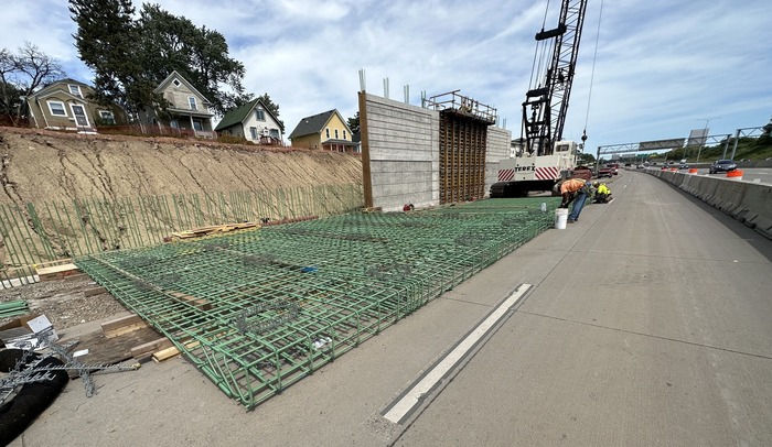 Crews prepare rebar for retaining wall near Earl Street.in East St. Paul