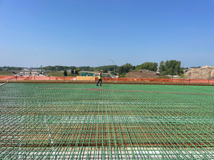Crews construct bridge decking on the new Bielenberg Drive bridge