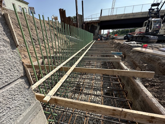 Crews construct retaining walls near Earl Street in East St. Paul