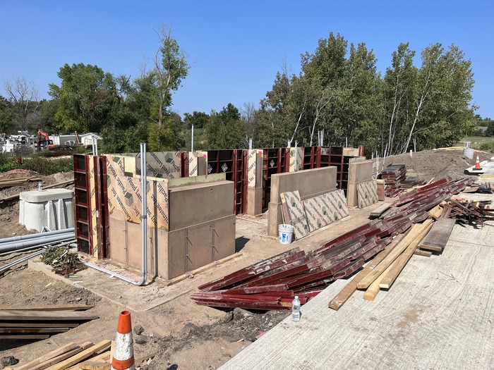 Crews build the Helmo Station in Oakdale