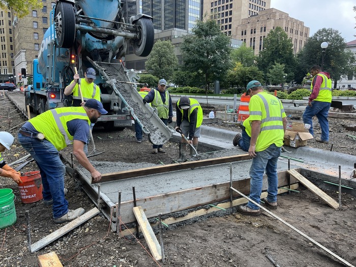 Crews pour concrete at future Rice Park station in Downtown St. Paul