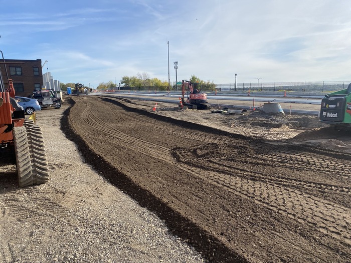 Crews grade Mounds Boulevard in preparation for paving in East St. Paul. 