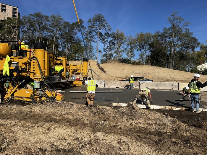 Crews pour northbound Highway 61 ramp lanes East St. Paul