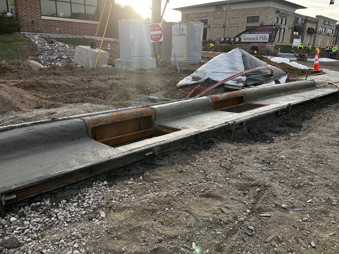 Crews install curbs along Bielenberg Drive in Woodbury
