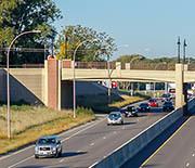 Vehicles on a divided highway.