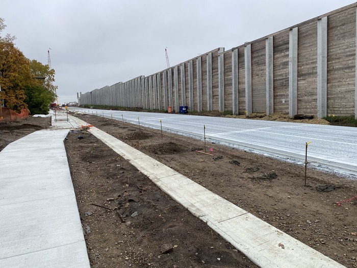 Crews install sidewalks along Hudson Road in East St. Paul