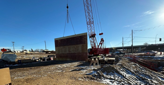 Crews construct footings for bridge abutment near Century Avenue in East St. Paul