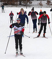 Group of people on skis at Battle Creek Regional Park.