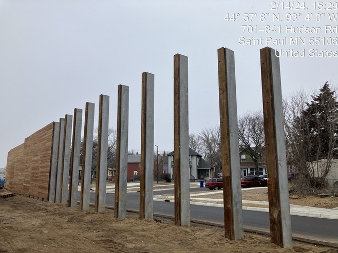Crews install wood for noise walls in east St. Paul