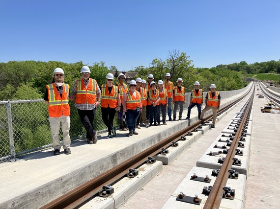 Photo of a group on a walking tour along the Green Line Extension Project area.