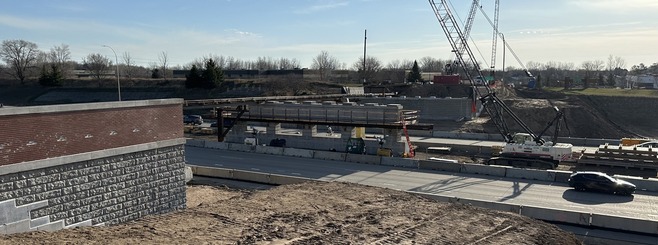 Crews reconstruct the 4th Street bridge over I-694 in Oakdale