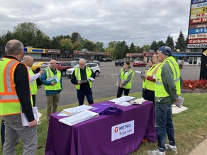 Members of the community gathering at an outreach event