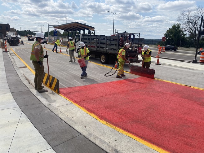 Crews began painting bus lanes this week