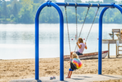 Kids swinging at Lake Nokomis