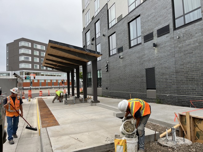 Crews construct the 5th & Smith Avenue Station platform