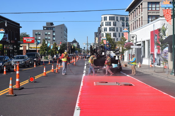 Crews paint the bus-only lane moving west from Lake St. & Bryant Ave.