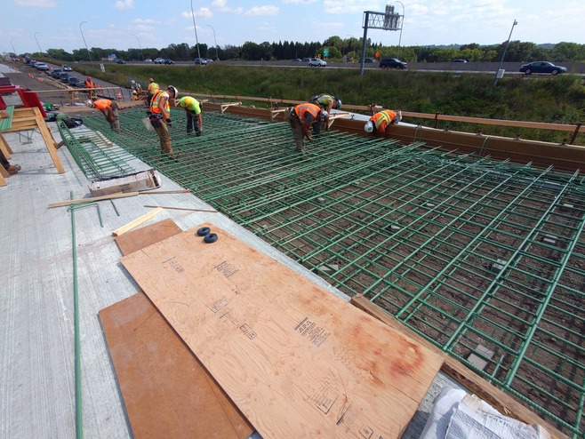 Crews install rebar on the bus guideway between Century Avenue/Highway 120 and McKnight Road.