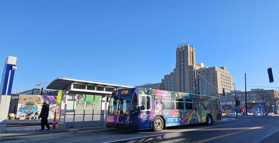 A Route 21 bus serving customers at the future Lake & Chicago B Line station