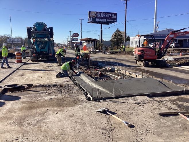 Crews construct medians along Hudson Boulevard near Greenway Station