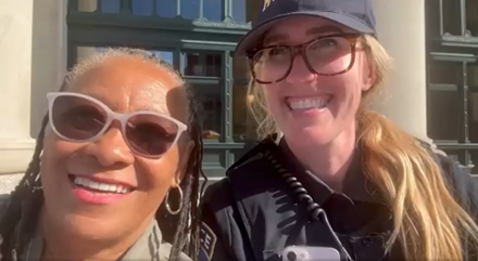 Council Member Toni Carter with Metro Transit Police Officer Katherine Kompelien