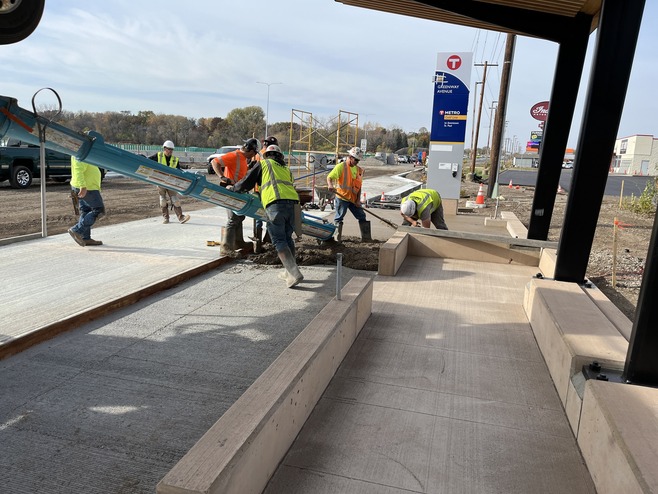 Crews pour concrete at the Greenway Station