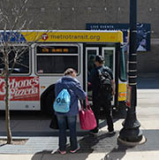 People boarding a bus.