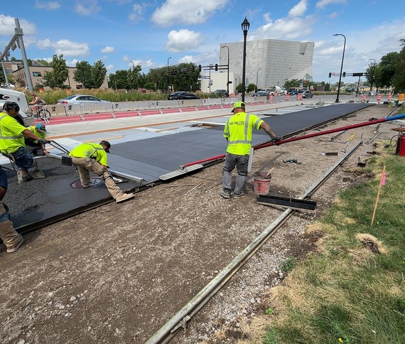 workers floating concrete