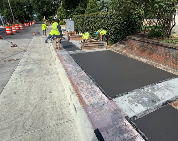 Workers floating concrete