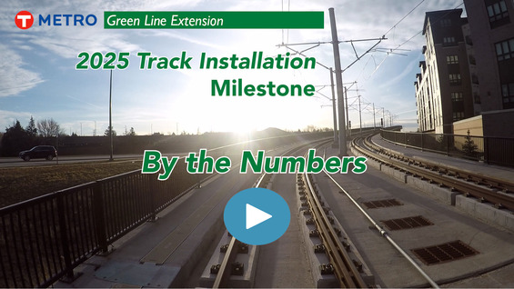 A picture of light rail track with the words "METRO Green Line Extension Track Installation Milestone By the Numbers"