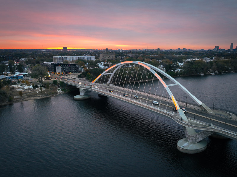Aerial view of the Lowry Avenue Bridge at sunrise.
