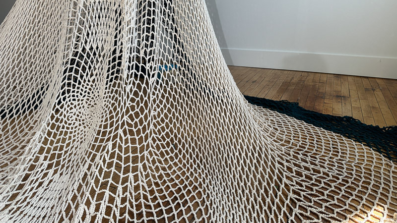 A large net suspended from the ceiling.