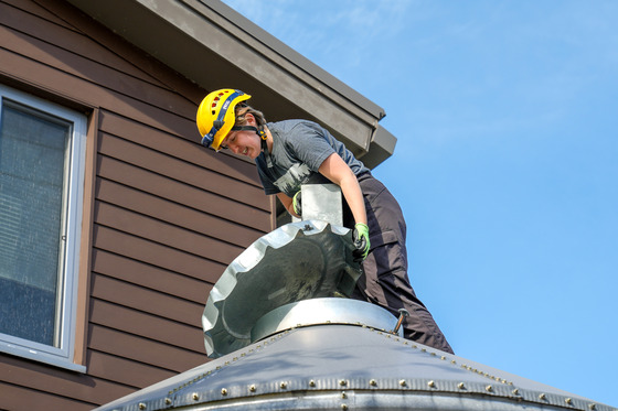 Environmental Specialist, Eva Hanson, closing the MWMO cistern for the winter