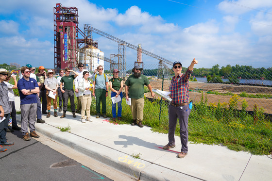 MWMO's Emily Resseger speaking at a tour of Upper Harbor Terminal