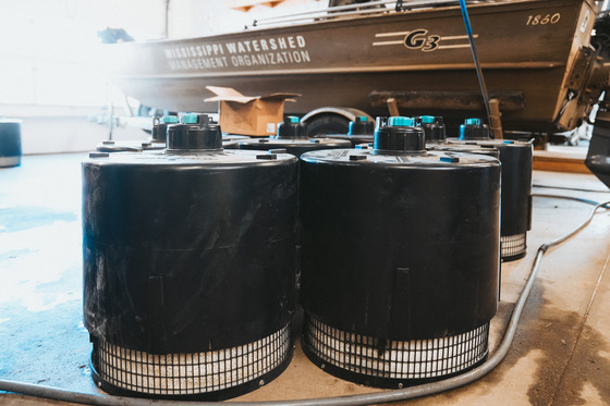 Stormwater filter cartridges staged in front of MWMO's boat in preparation for pre-testing.