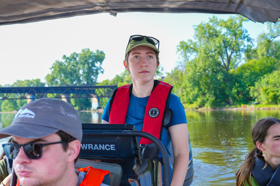 MWMO Staff driving our boat during a mussel relocation effort