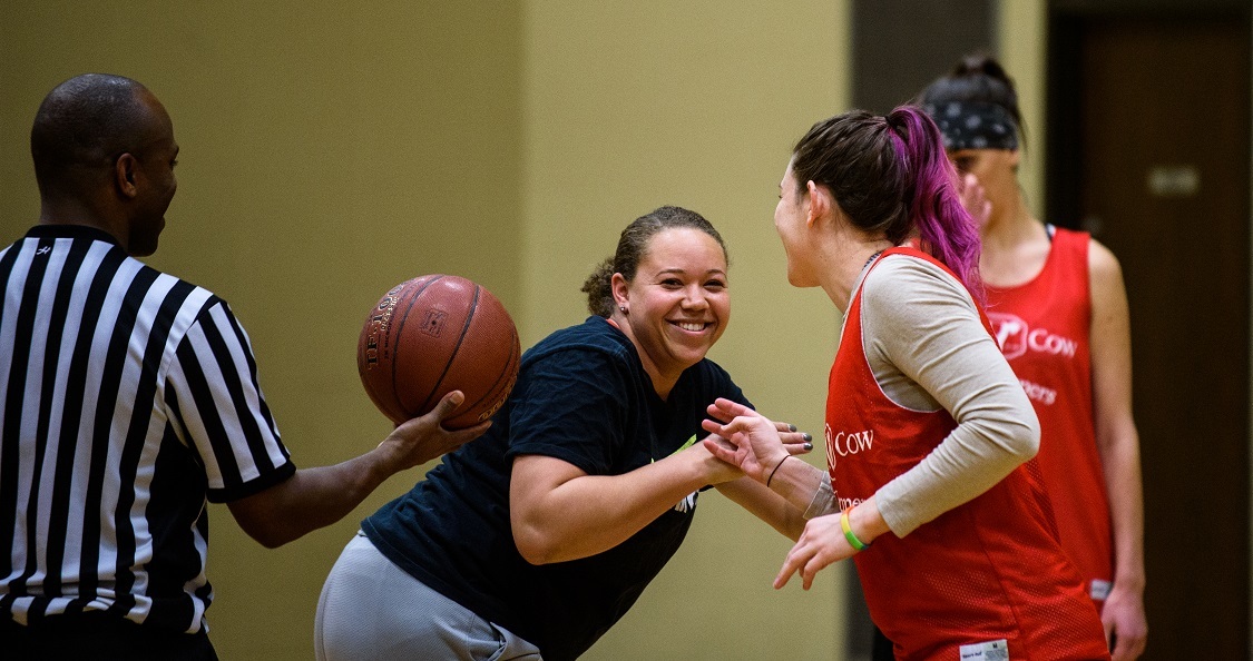 Tip-off at a women's basketball game at Lynnhurst Recreation Center