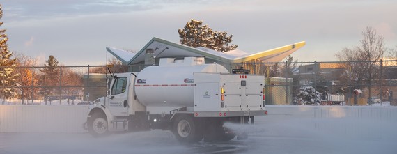 A large truck clears and floods an ice rink at Bohanon Park in early morning December 2022