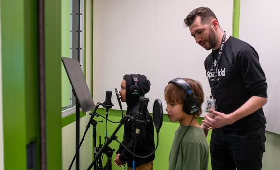 Spark'd Studios at Harrison Park instruction in recording booth