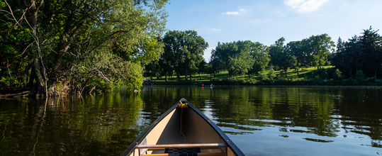 Early evening POV from canoe on the water