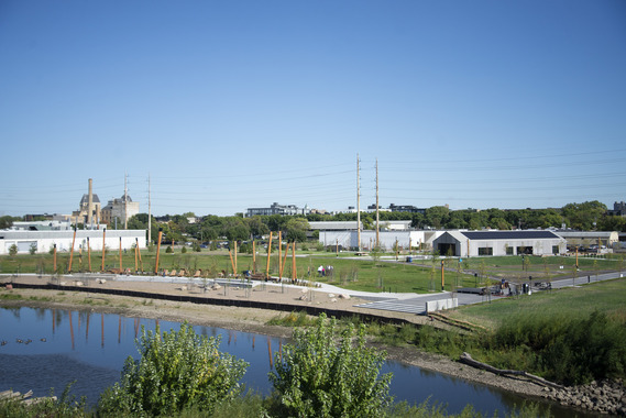 An elevated view of Graco Park from the Plymouth Avenue Bridge on bright sunny day