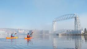 Duluth harbor with kayakers and aerial bridge
